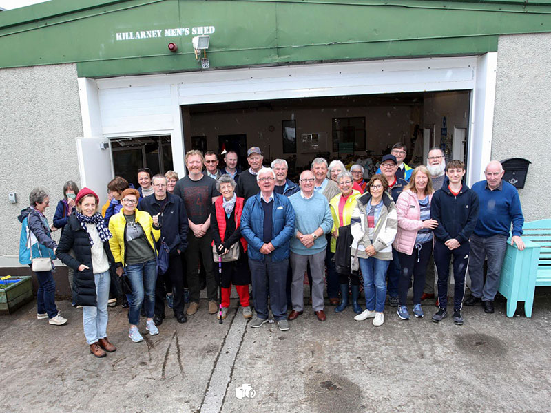 Killarney Men's Shed - group of people standing with Cormac Begley